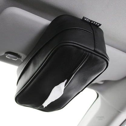 Black leather hanging storage box with PU coating, dimensions 23x13x9cm, shown behind a car headrest