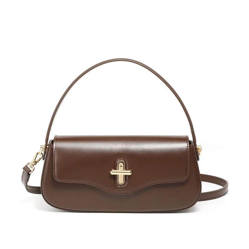 Genuine leather baguette handbag in clamshell design with internal organiser compartments