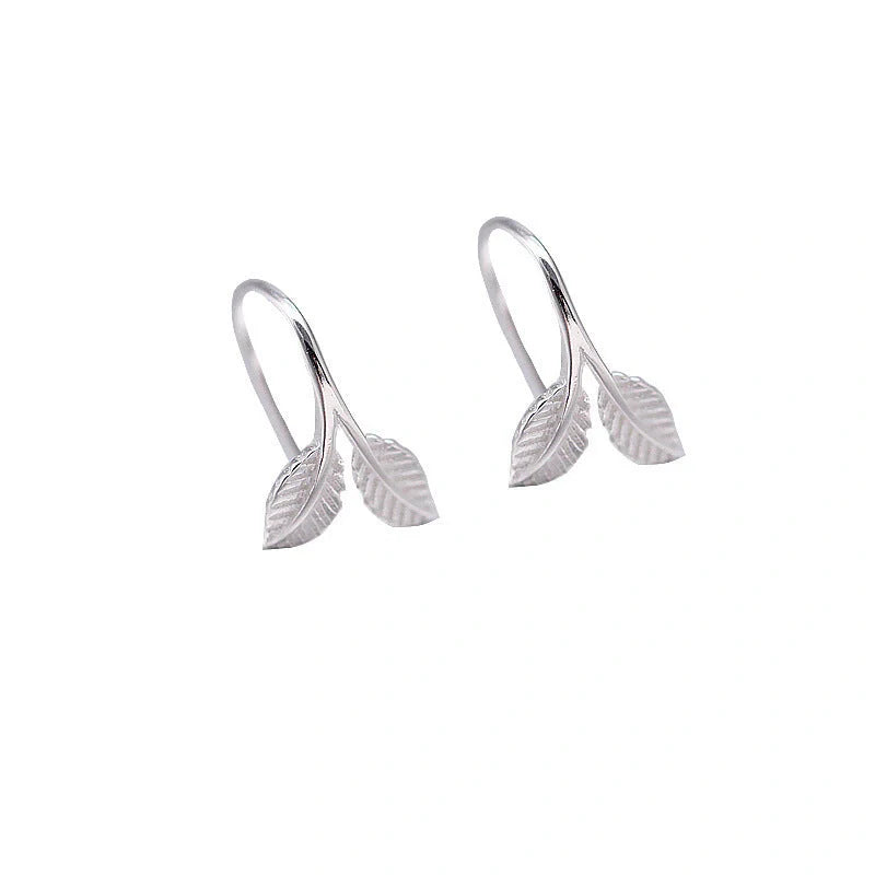 Handmade S925 sterling silver branch bud earrings in gold and white gold finishes.