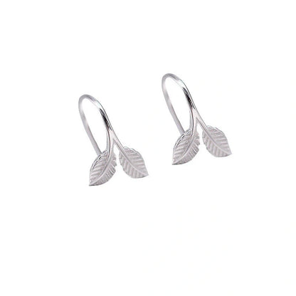 Handmade S925 sterling silver branch bud earrings in gold and white gold finishes.
