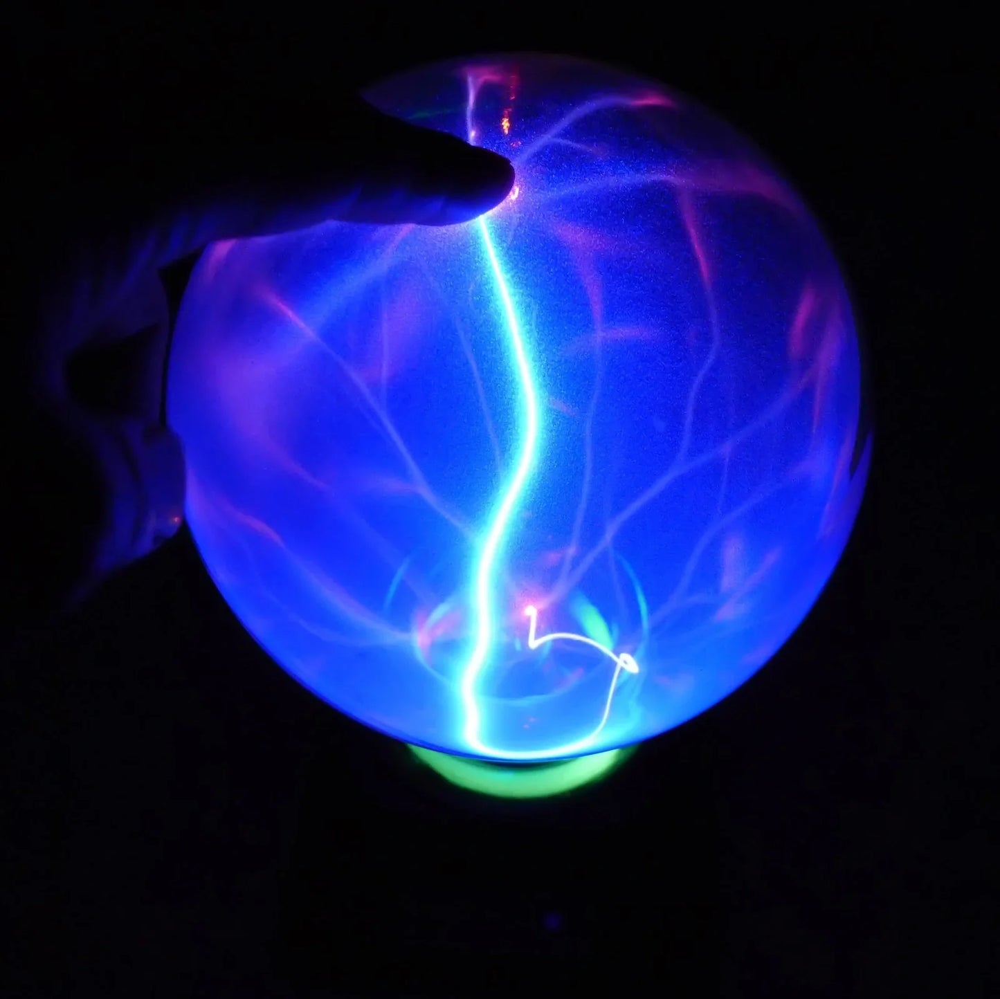 Plasma lightning ball with colourful electrostatic patterns inside 6-inch glass sphere responding to touch