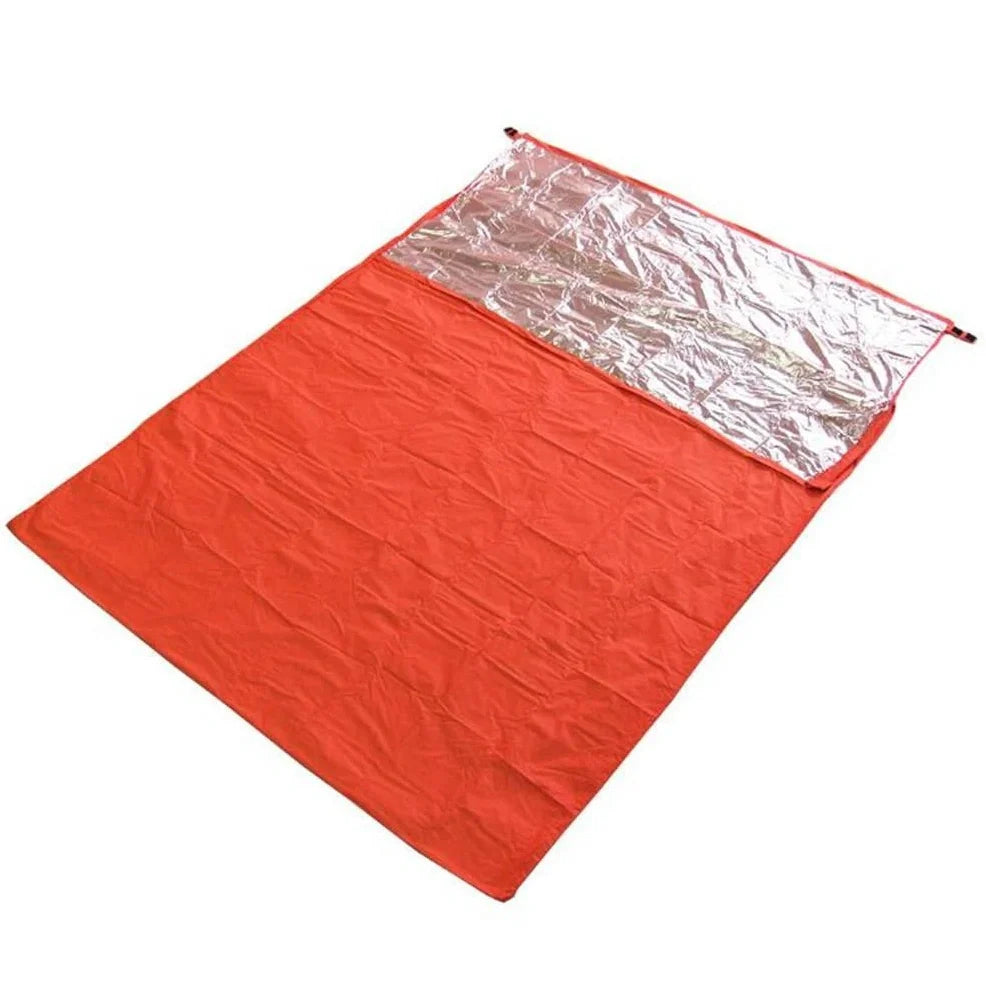Orange outdoor sleeping bag with silver-coated nylon fabric for heat reflection during camping