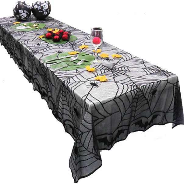 Black lace mesh Halloween tablecloth with spiderweb design, perfect for festive autumn and Halloween decor