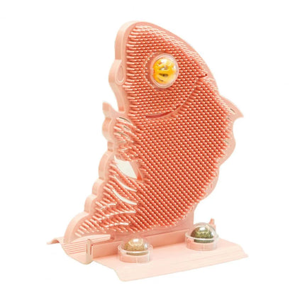 Blue fish-shaped cat wall scratcher with grooming brush, two catnip balls, and bell on white base