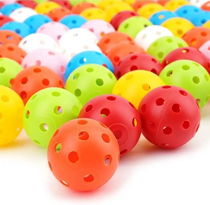 Multi-colour golf practice balls in red, orange, blue, green, white, and yellow, 42mm diameter, packed in a net pocket