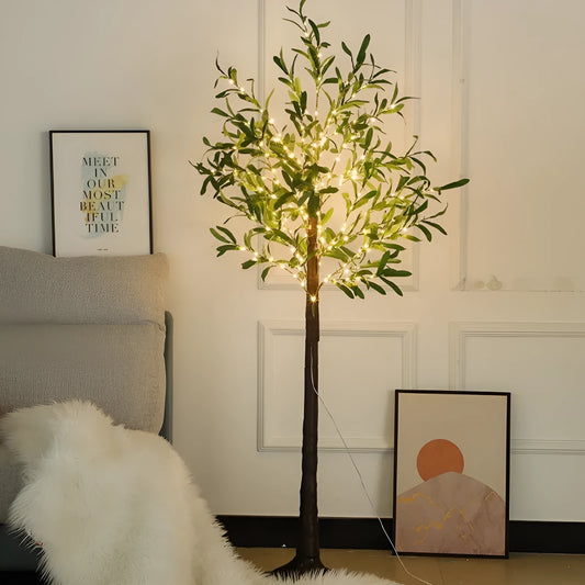 1.8 metre tall artificial olive leaf tree lamp with warm white LED lights in courtyard setting
