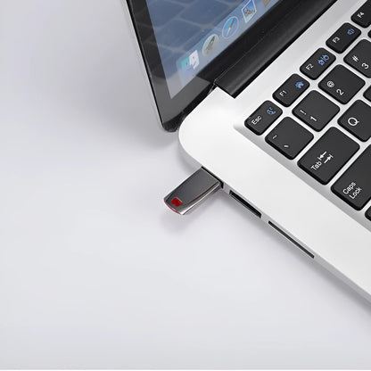 Metal USB flash drive showing creative design with USB 2.0 connector, capacity options from 8GB to 2TB