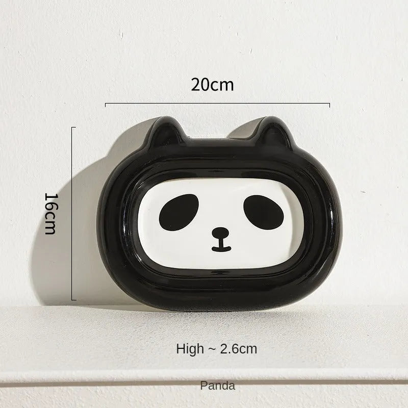 Handcrafted ceramic pet bowl with an animal design, for cat or dog food and water.