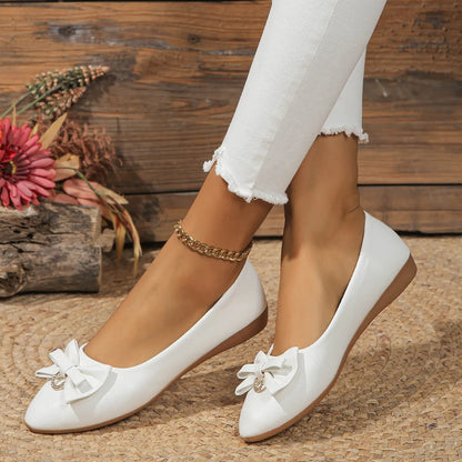 Women's beige flat casual slip-on shoes with bowknot detail and shallow mouth design