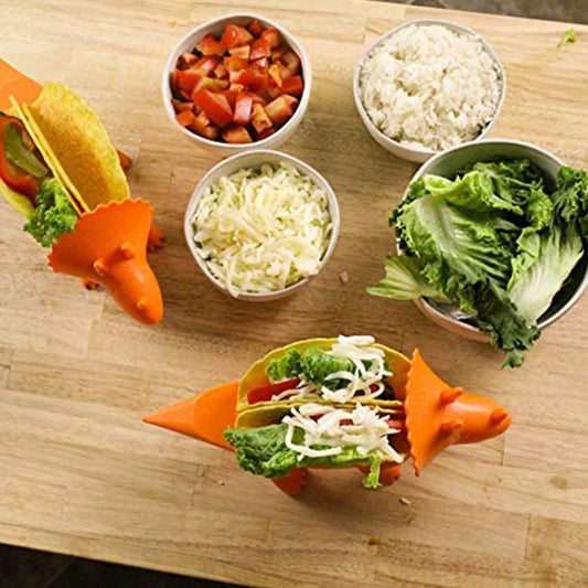 Dinosaur-shaped taco holder in food-grade ABS plastic, available in Army Green, Light Green, and Pink