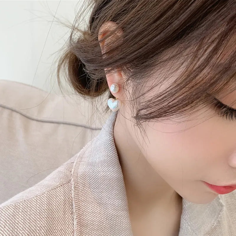 A pair of Korean style heart-shaped stud earrings in alloy with electroplated finish and inlaid artificial gems.