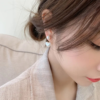 A pair of Korean style heart-shaped stud earrings in alloy with electroplated finish and inlaid artificial gems.