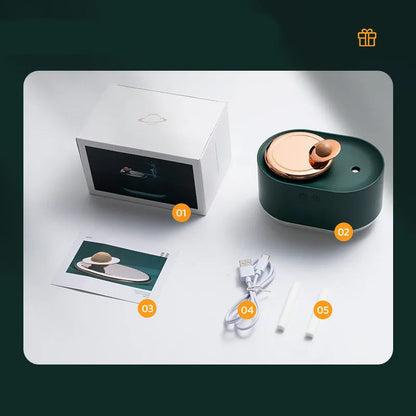 Rotating planet-shaped humidifier in green colour with USB cable and mist emitting from the top.