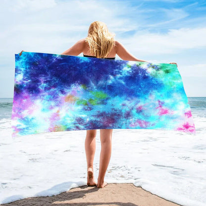 Square beach towel with tie-dye pattern showing superfine fibre texture and vibrant colours