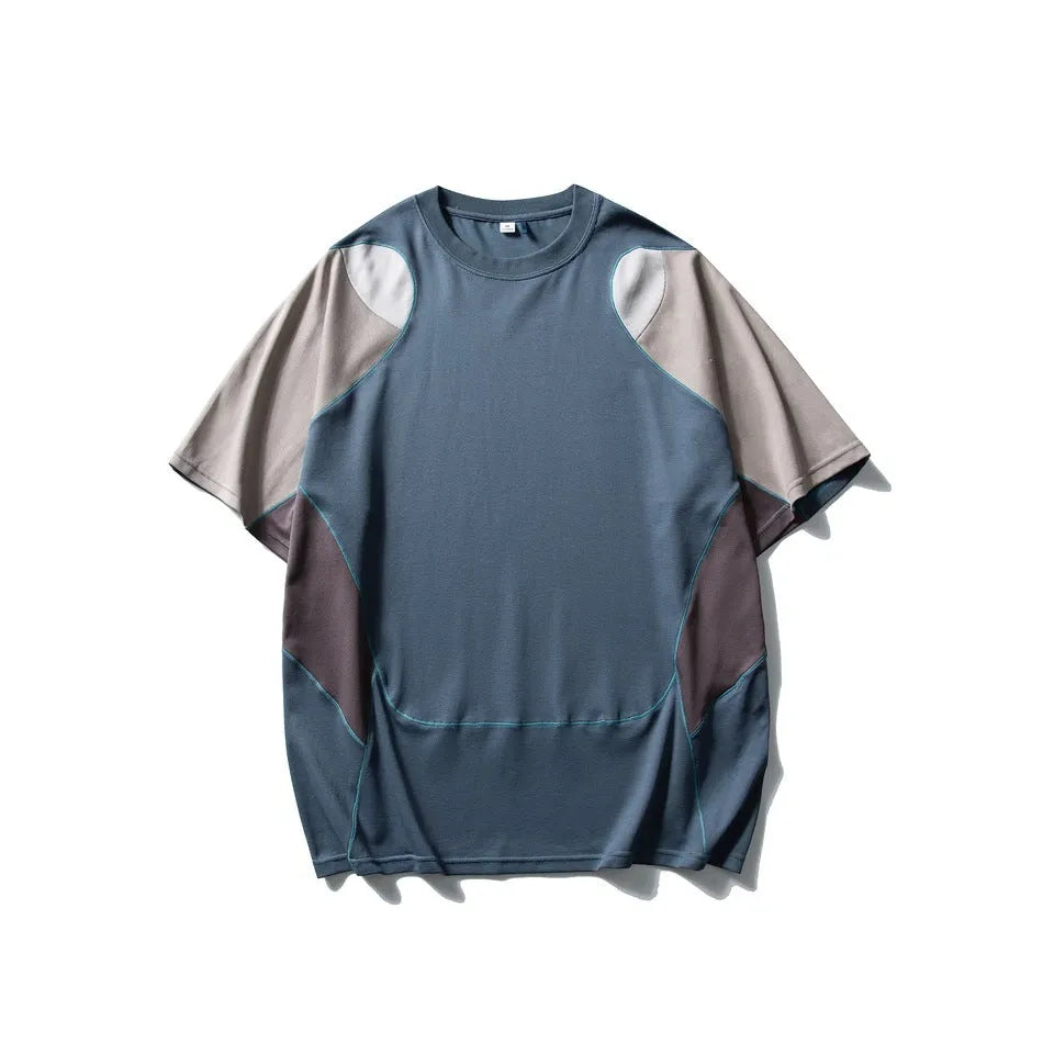 Men's loose blue cotton blend sports T-shirt with short raglan sleeves on a hanger.