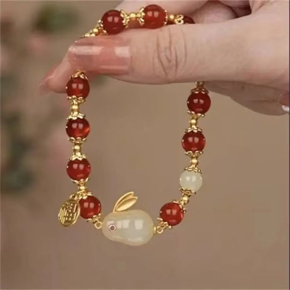 Unisex peace buckle bracelet with glass beads, coloured glaze components and rabbit motif in national style design
