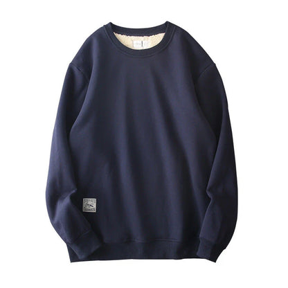 Cozy fleece pullover in a variety of classic colors, featuring a warm and soft fabric blend, stylish round neck design, and comfortable long sleeves.
