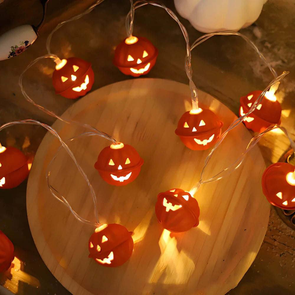 Halloween pumpkin string lights with iron shells, warm white illumination, battery operation