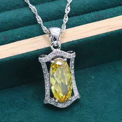 Women's yellow and olive alloy zircon jewellery set with necklace, earrings, ring, and bracelet on a snake bone chain.