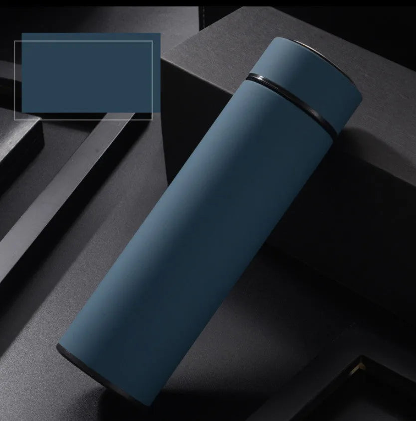 Stainless steel water bottle with double-wall vacuum insulation, shown in black, red, gold, and blue colour options.