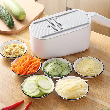 Nordic style kitchen vegetable slicer in blue, grey, or khaki colours with stainless steel cutting components