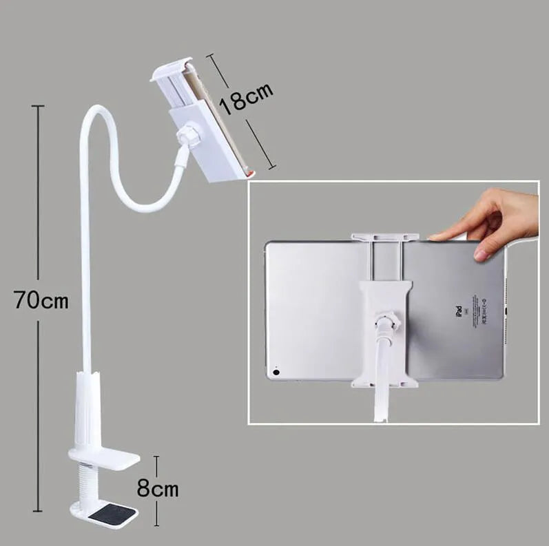 Bedside oversize flat panel handset with long arm holding a mobile phone on a table