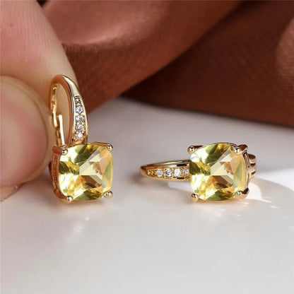 Square zircon inlaid ear hook earrings with geometric design and electroplated finish in golden tone