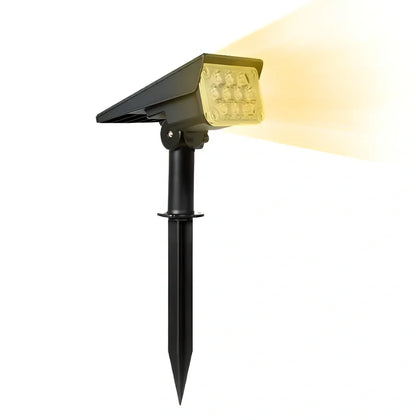 Adjustable solar garden light with black ABS/PC housing and directional spotlight head