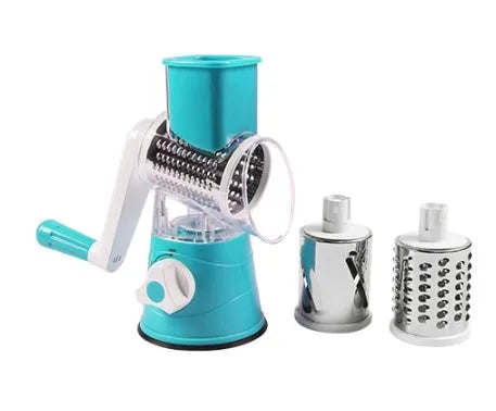 Hand drum rotary grater with handle and food-grade stainless steel blades, shown in Blue, Green or Red for cutting carrots and potatoes.