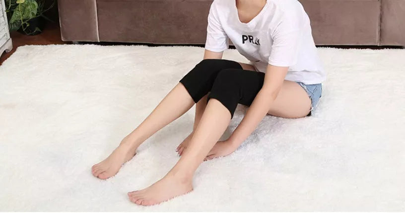 Compression knee support sleeves for joint pain and arthritis relief in black, skin, and gray