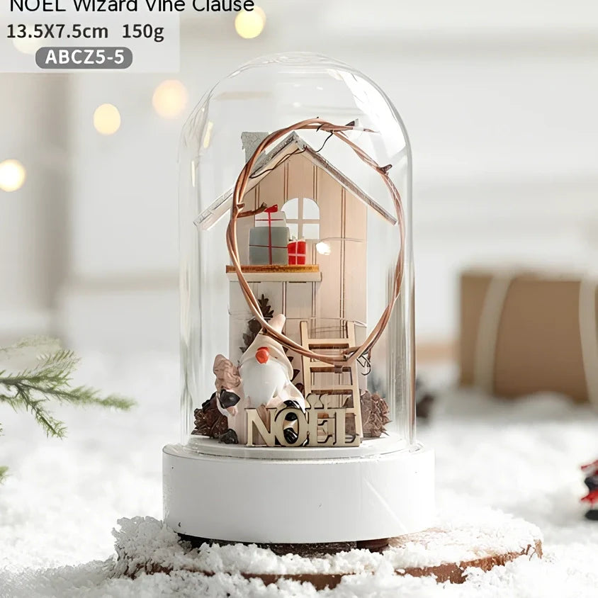 Small 15 cm glass reindeer night lamp in white snowman cabin style casting 100 lumen festive glow on table