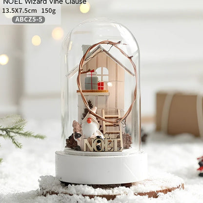 Small 15 cm glass reindeer night lamp in white snowman cabin style casting 100 lumen festive glow on table