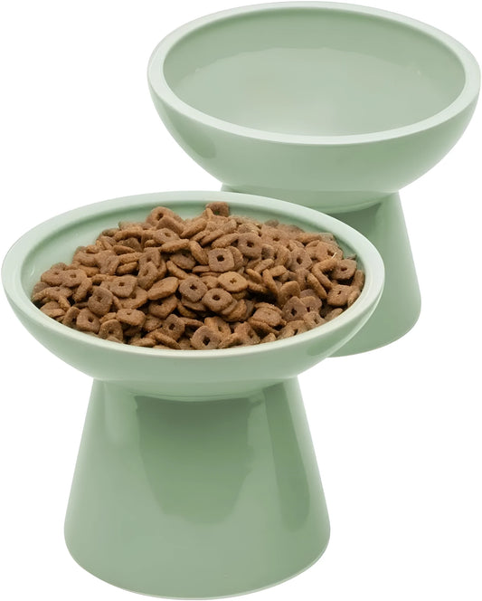 Elevated wide shallow ceramic cat food and water bowl in blue, green, pink, or white colour options.