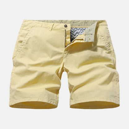 Men's blue denim casual shorts with a loose fit, no belt, and straight legs on a plain background.