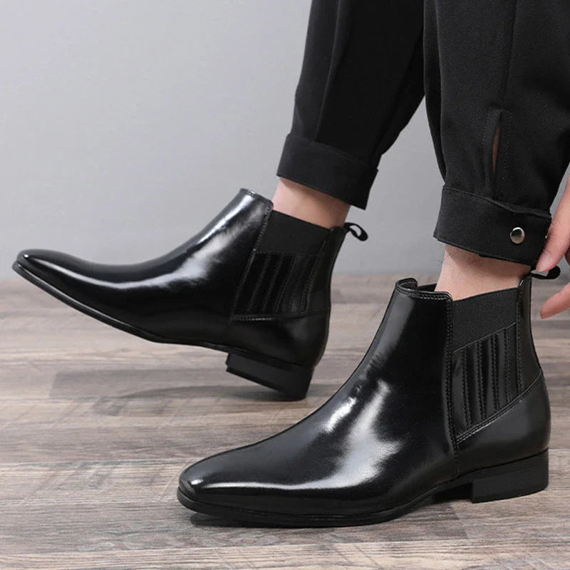 Sleek Chelsea-style boots for men with pointed toe and square heel, available in black and brown colors