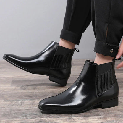 Sleek Chelsea-style boots for men with pointed toe and square heel, available in black and brown colors