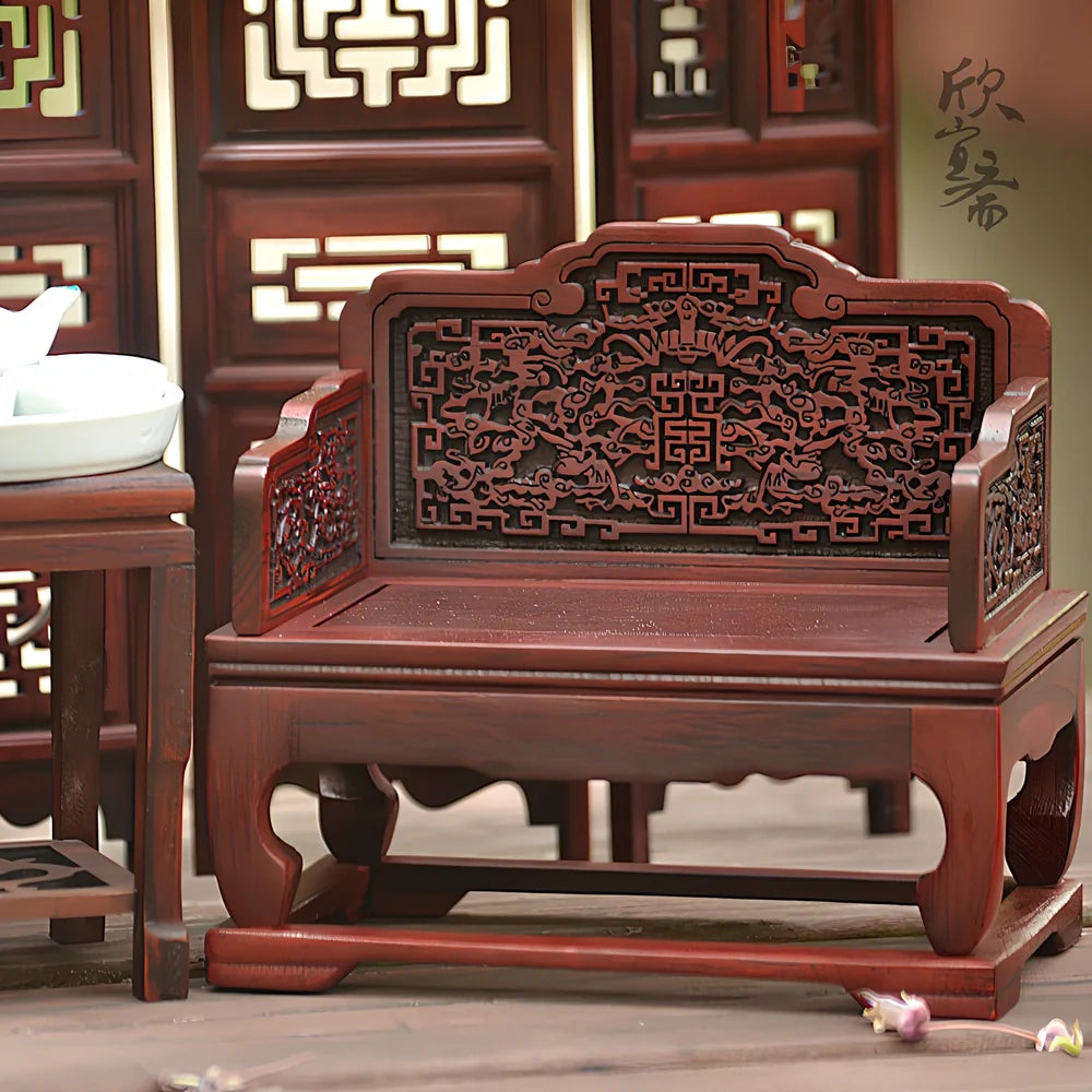 Red rosewood miniature Chinese furniture model with traditional carved details and mahogany construction