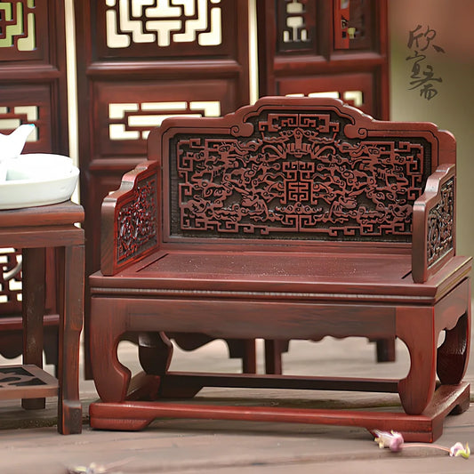 Red rosewood miniature Chinese furniture model with traditional carved details and mahogany construction