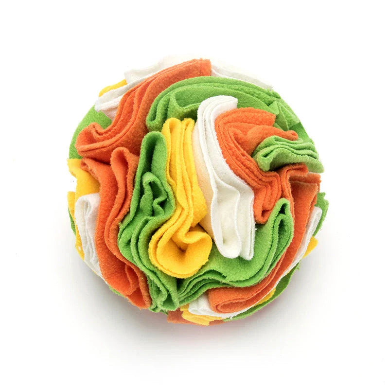 Soft and interactive puzzle ball toy made of polar fleece for dogs and cats to sniff and forage for hidden treats