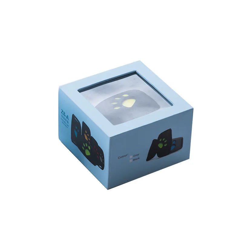 Waterproof GPS pet tracker in black, sky blue, pink, and grass colour options showing compact 65.5mm design