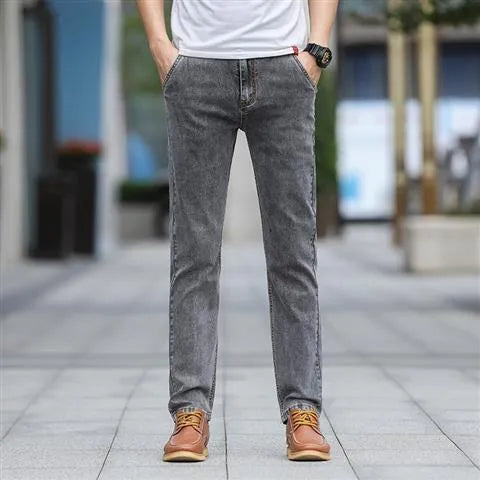 Smoky gray men's straight leg jeans with rabbit fur fabric on a hanger.