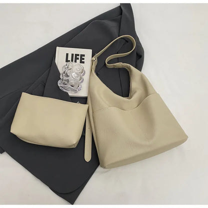 Women's soft PVC bucket shoulder bag with single strap, open pocket, phone pocket, and matching wallet