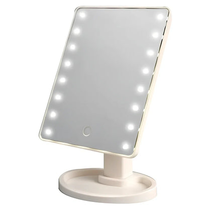 Portable tabletop cosmetic mirror with LED lights around edge, showing 360-degree rotation capability