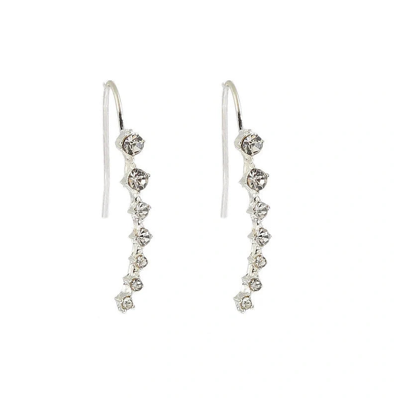 Elegant 7-inch rhinestone bridal earrings sparkling on a white background