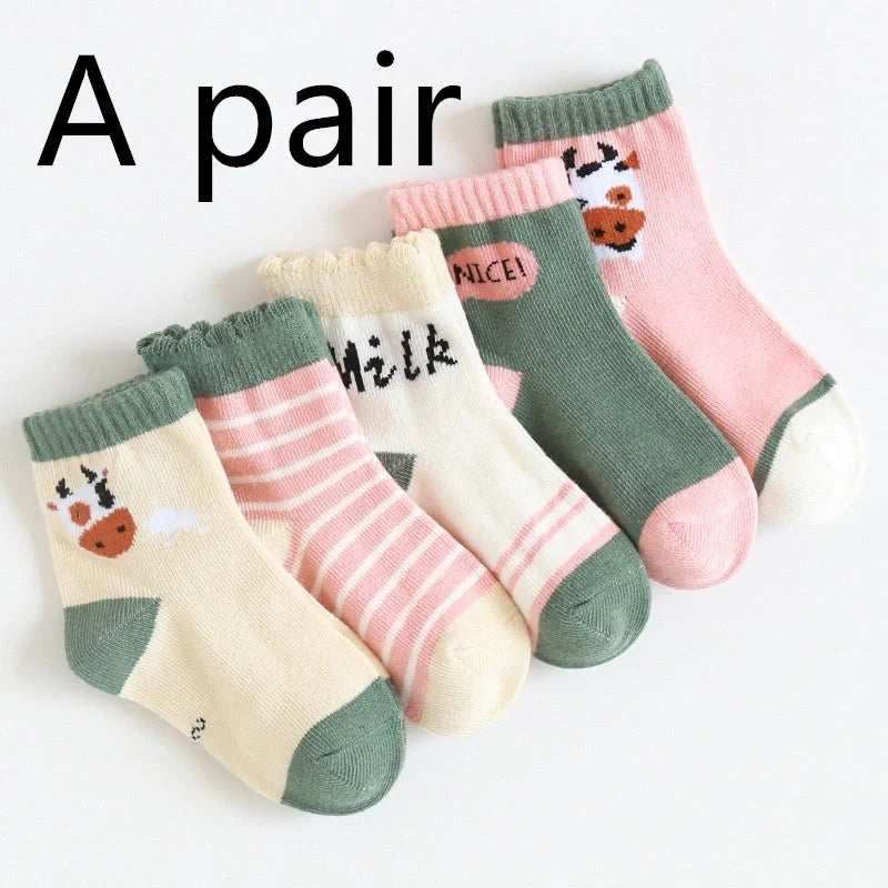 Kids' cartoon stockings with jacquard designs in various colors and patterns
