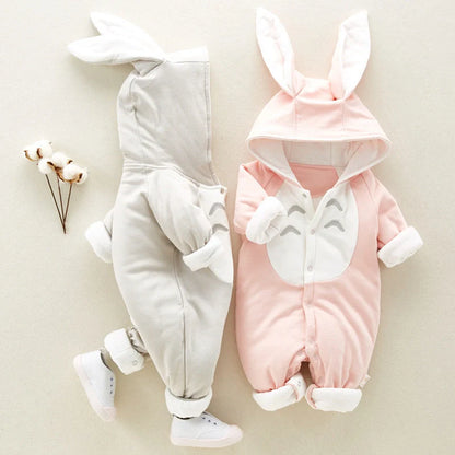 Cozy cotton baby romper with plush hooded design, available in pink, gray, and blue colors and various sizes