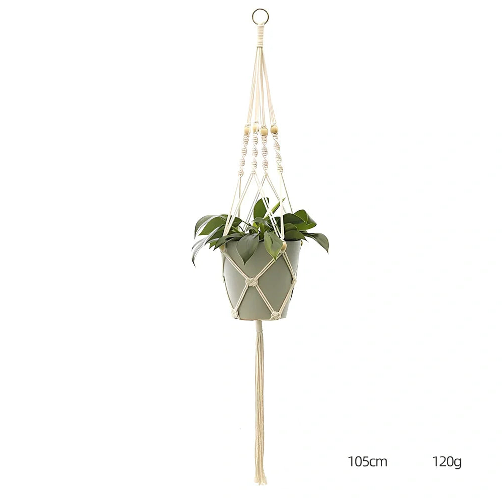 Hand-knitted cotton flowerpot net bag showing mesh pattern and hanging installation