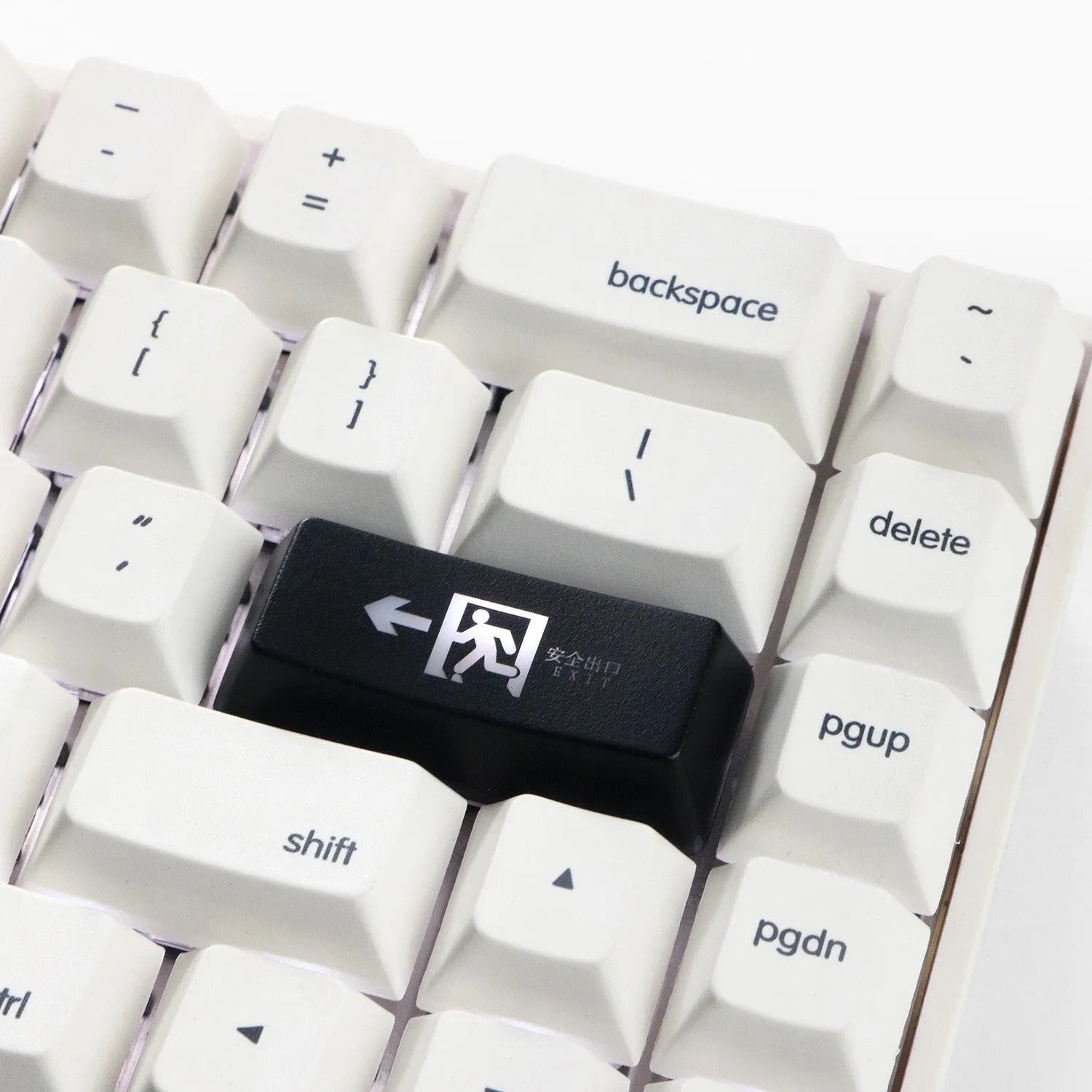Transparent mechanical keyboard key cap with safety evacuation exit design in red colour