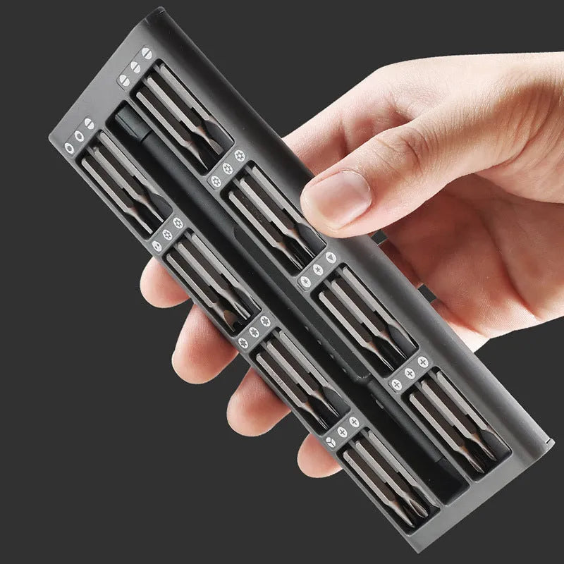 49-in-1 magnetic screwdriver set for phone repair with nickel aluminium bronze handles in a holder.