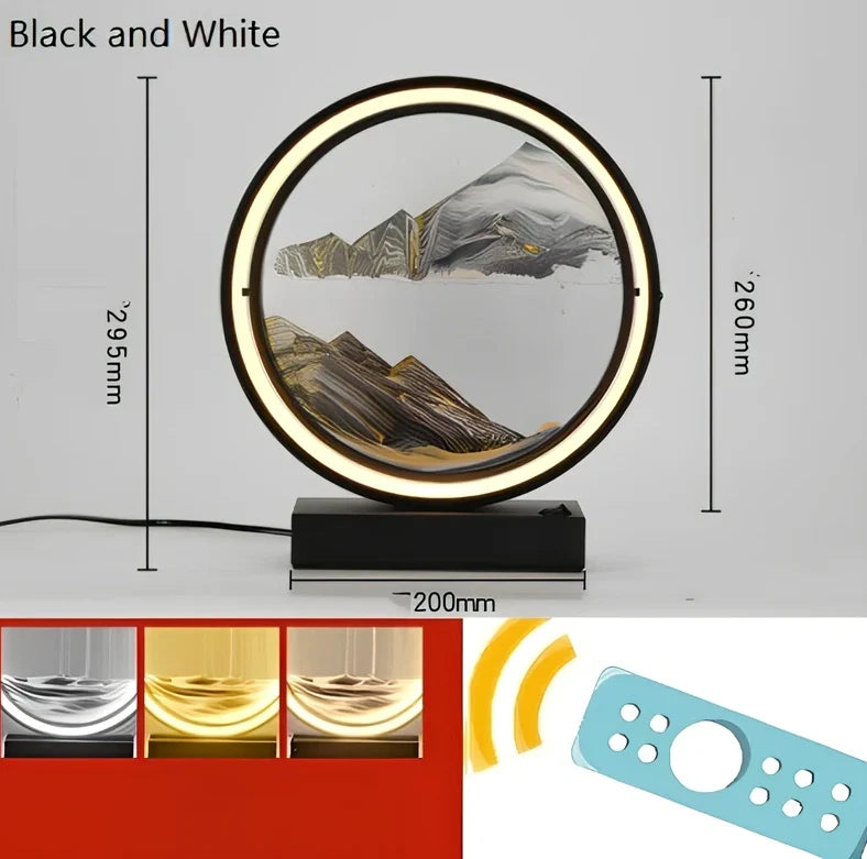 Black and white quicksand table lamp, 295mm tall with LED lights and remote control, coloured sand in glass chamber
